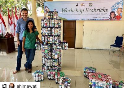 Senior GEA Trainers, Ani and Russell pose with a set of dieleman ecobrick lego modules at a city event in Cilacap, Central Java Indonesia.